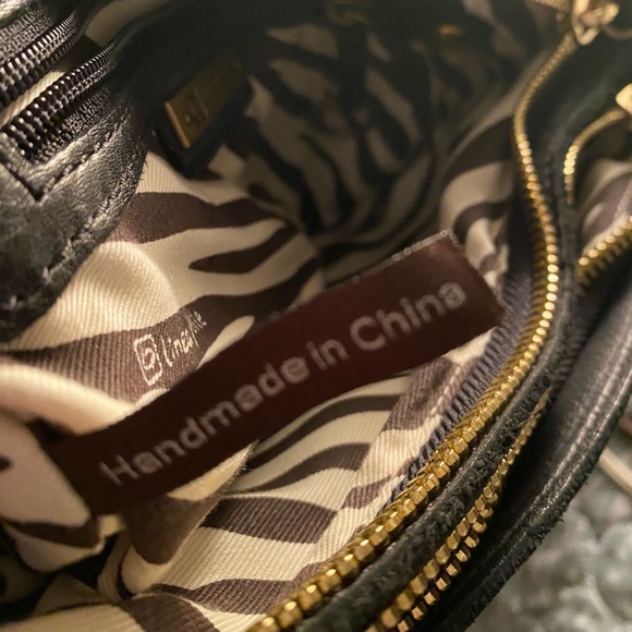 Línea Pelle black leather clutch - Picture 12 of 16